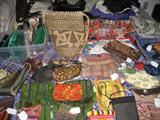 Huge collection of hand woven and beaded bags.