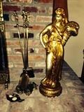Some fireplace tools and a plaster cast statue from 1970's.
