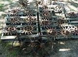 Old cast iron cultivator wheels