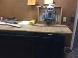 Great workroom with tools and this saw for sale