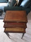 Leather inlaid nesting tables from Henredon