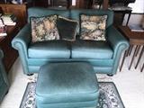 Second of a pair of leather loveseats with ottoman by Century Furniture Co. of North Carolina