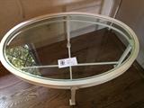 Oval glass top coffee table