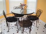 Vintage Black Wrought Iron Dinette Set, round glass top, 35” diameter, 4 chairs, sturdy, heavy duty iron, great condition