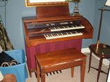 Story and Clark Organ with wood bench and music books. Excellent condition. Excellent condition.