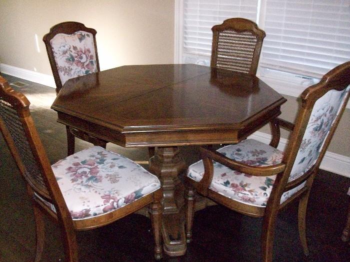 Drexel table and chairs, has two leaves and two more side chairs and table protector $250.00