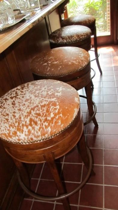 Cowhide bar stools.  Welcome to Texas!