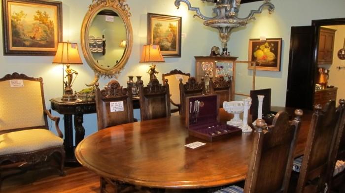 Enormous oval dining room table and 10 chairs