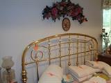 brass headboard, queen bed
