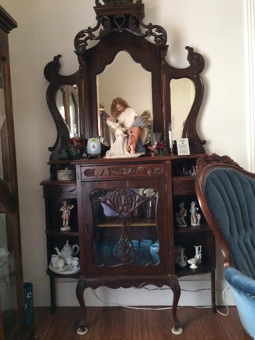 One of a kind finds,  antique carved wood, walnut or cherry, mirrored display cabinet 