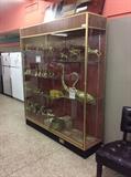 Retro Lighted Glass Shelved Showcases.  Many BRASS items.