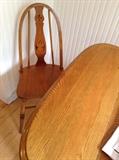 4 chairs and the table is drop leaf