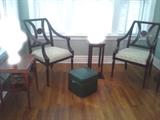 Side chairs, ottoman, and side tables.