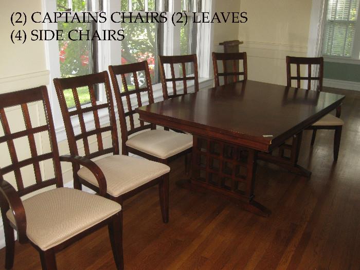 Very good condition Dining Room table with (2) leaves. (2) Captains chairs and (4) side chairs.