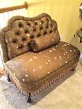 Upholstered & tufted settee