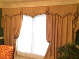 All custom-made drapes and window treatments are for sale