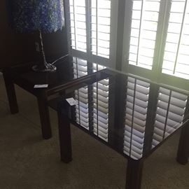 Pair of glass top/rattan base end tables