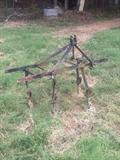 4 shanks Two Row Cultivator, 5' angle iron draw bar. 