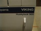 Viking Huskylock 905 Husqvarna Sewing and separate embroidery machines with extending cabinet.