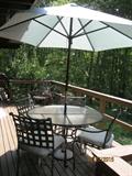 Outdoor patio table chairs and umbrella