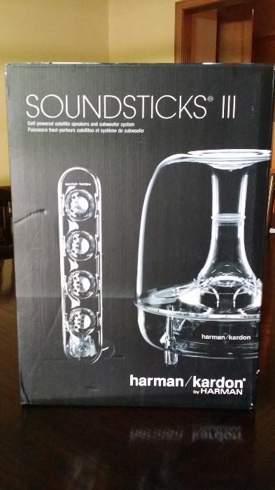 Harmon/Kardon Soundsticks III. Speaker & Subwoofer System. 'As a three-piece, 2.1-channel multimedia sound system, SoundSticks III brings a new level of excitement to music, games and movies to your home – with its exceptional sound clarity, enhanced color scheme and bare minimum of wiring.' www.harmankardon.com