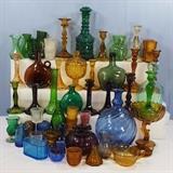 Collection of Colored Mid Century and related Glass Bottles, Votives, Candlesticks and More