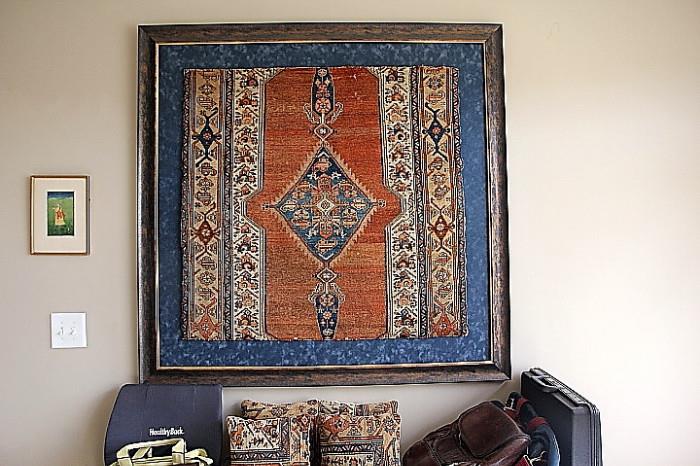 framed Persian rug fragment with matching pillows