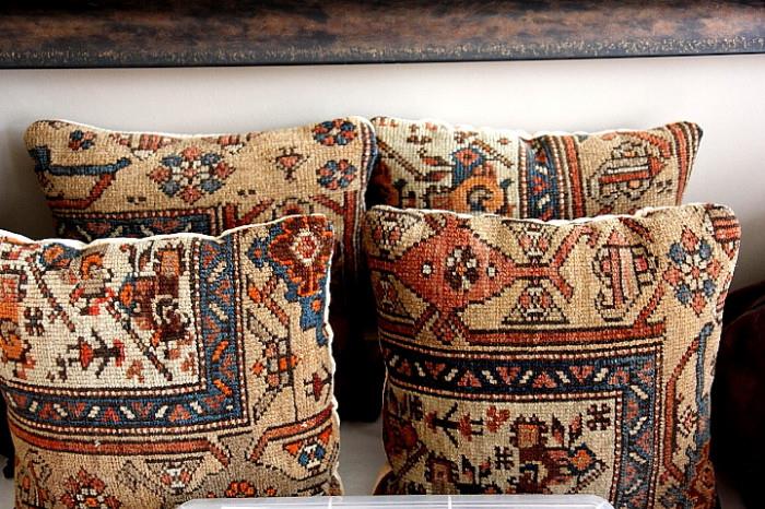 matching pillows made from an antique Persian carpet
