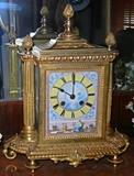 Marvelous little French ormolu clock with Sèvres-type porcelain plaque inset
