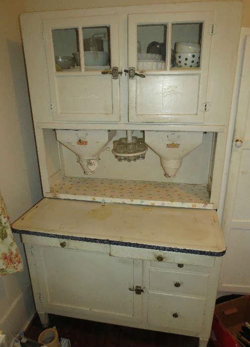 Awesome Antique 1925 Hoosier by name Hoosier Cabinet with Flour & Sugar and Spice Jars, It also has the Louvered doors. All Original