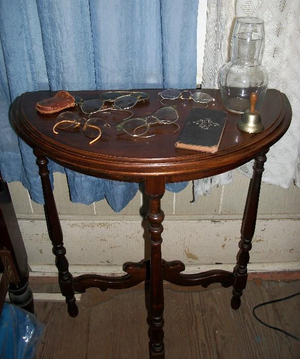 Another great little antique table, antique eye glasses.