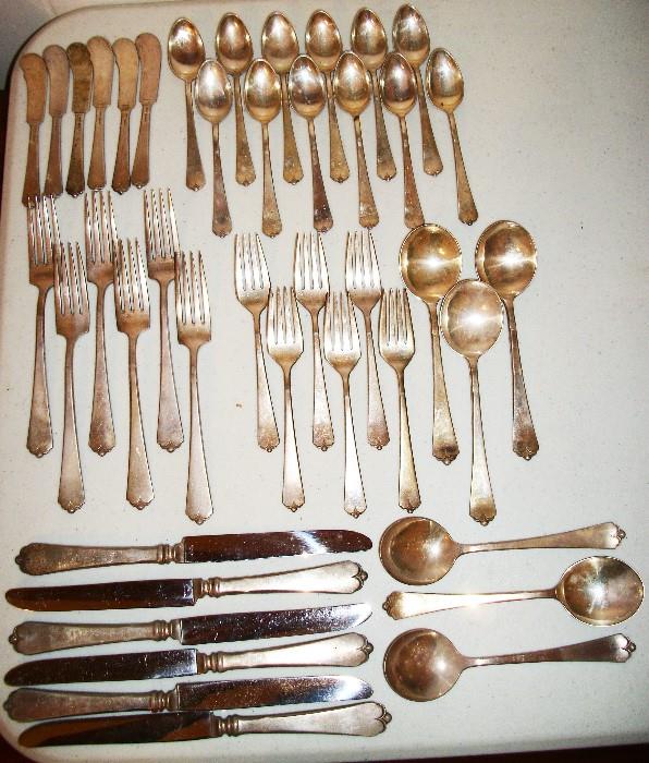 Beautiful Antique Set Of Watson & Wallace Sterling Silver Flatware in the Lotus Pattern. This is a 42 Piece set and is a service for 6 with 6 extra Tea spoons. Total weight is 1,447 grams
