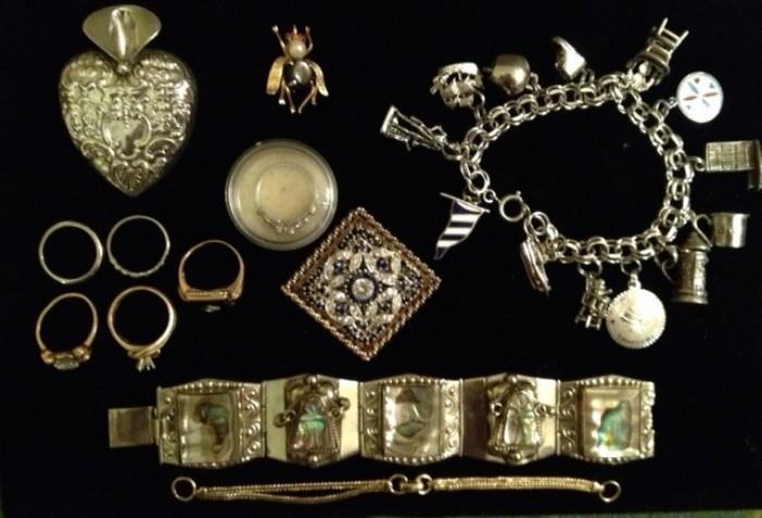 18k/14k/10k gold, rare Du Jay sterling brooch in the middle, in the round case is a platinum ring setting with a loose diamond, above that is a 14k bumblebee brooch top, very bottom is a 14k extender