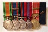 Royal Canadian Air Force medals: Battle of Britain, Canadian Forces Volunteer medal bar, 1939-45 Victory medal, Queen Elizabeth Coronation Medal, Canadian Forces Decoration medal & bar, Queens Commendation for Bravery