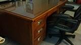Indiana Desk Co. vintage wood desk and black executive chair