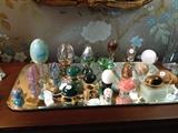Large Collection of Art Glass Egg Paperweights.