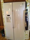 GE Side by Side Refrigerator w/Water Dispenser.