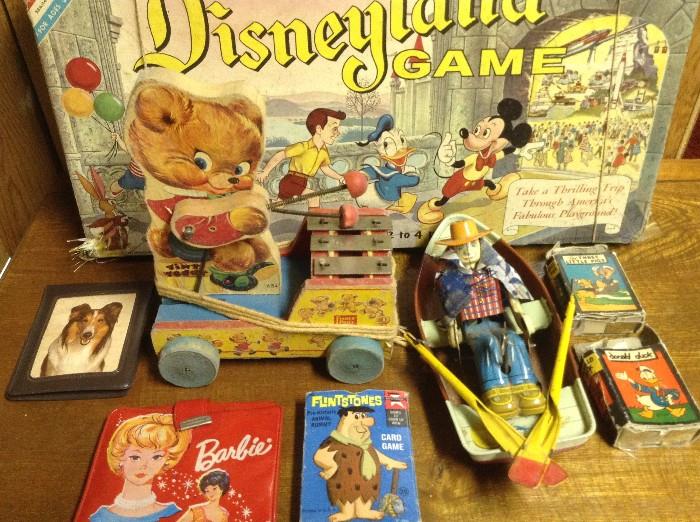 Lots of vintage toys:  dolls, board games, metal cars and trucks