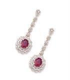 Lot 75: A PAIR OF RUBY AND DIAMOND DANGLE EARRINGS