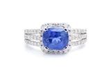 Lot 86: A COLOR CHANGE SAPPHIRE AND DIAMOND RING