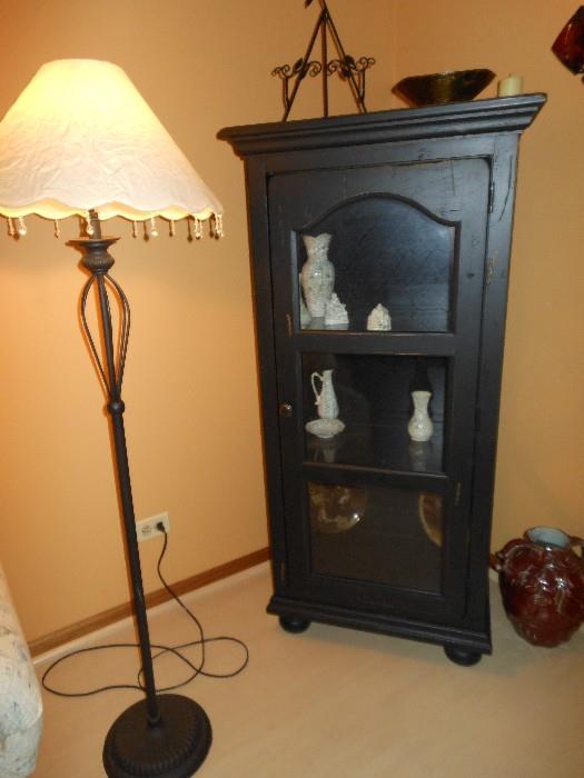floor lamp and black cabinet