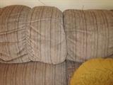 Neutral color velour, softly striped, sofa by Townhouse Penthouse Industries.  Has a matching love seat.