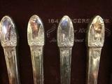 Silver plated flatware, service for eight, plus 11 serving pieces in storage chest.  Rogers Bros. 1847 IS, "First Love"