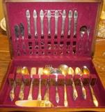 Silver plated flatware, service for eight, plus 11 serving pieces in storage chest.  Rogers Bros. 1847 IS, "First Love"