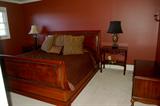 King size leather and cherry sleigh bed