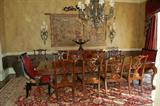 Henredon Rittenhouse Square Banded Burl clawfoot dining table with 8 Chippendale side chairs and 2 head chairs, 2 ebony upholstered chairs, large hand knot Persian area rug,European wall tapestry