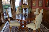 Round burlwood and cherry pub table and Harrison and Gill "Partygoer" chairs with goldleaf and beige ultrasuede.