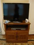 Magnavox Flat Screen TV and Cabinet