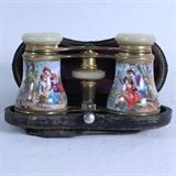 Pair of antique gilt-brass painted porcelain opera glasses from C.L. Byrd, Memphis, TN with original leather case: 2 1/2" from lens center to lens center. Engraved "[initials] 1888". Only the slightest crazing & minor chipping of porcelain, & some gilt is worn, otherwise no condition problems.