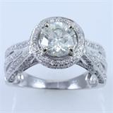 New 18K white gold diamond ring with ~2.05 ctw in diamonds; a ~1.25 ct round brilliant center diamond (SI3 clarity, K color) & ~0.80 ctw in round brilliant diamonds: size 6 1/2, 6.5 gms gross weight. Center diamond certified by E.G.L Gemological Laboratory. Center diamond appraised in 2012 by U.G.S (Universal Gemological Services) for $9,260.